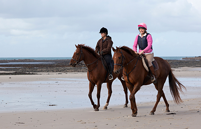 Woman with horse in winter